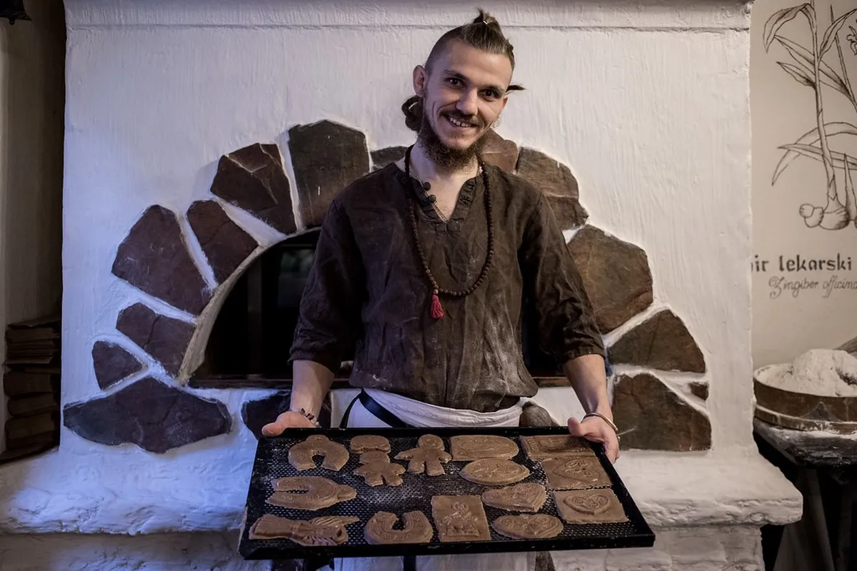 Traditional wooden molds and baking stations at the Gingerbread Museum in Torun