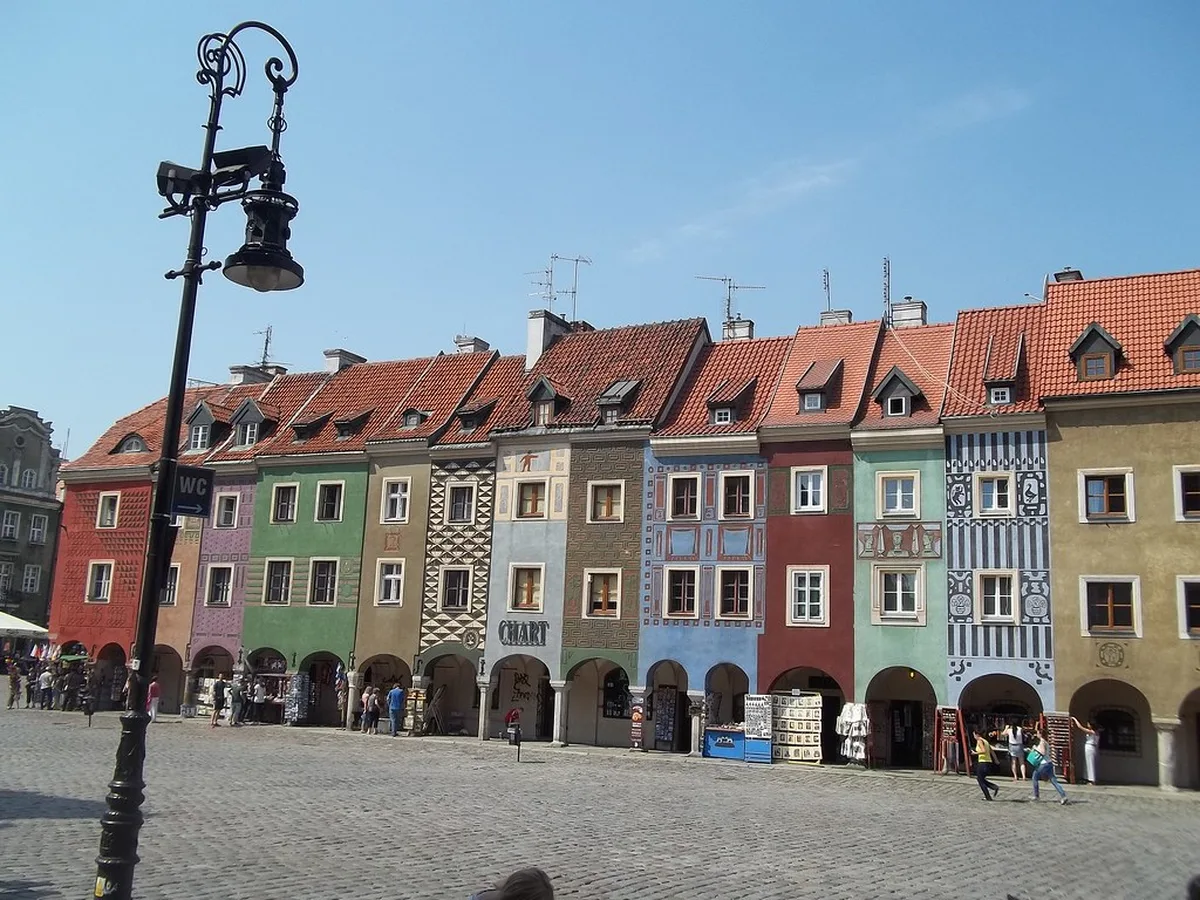 Colorful merchant houses lining Poznań's Old Market Square